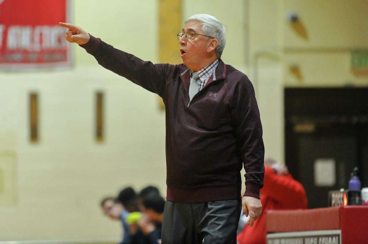 Head Coach Joe Gaetano of the Sheehan Titans directs his players during a game at the Platt Tech Holiday Tournament against the Foran Lions on Wednesday December 26, 2018 at Platt Tech High School in Milford, Connecticut. Gaetano retired from coaching Nov. 2, 2022 after 27 seasons at Sheehan.