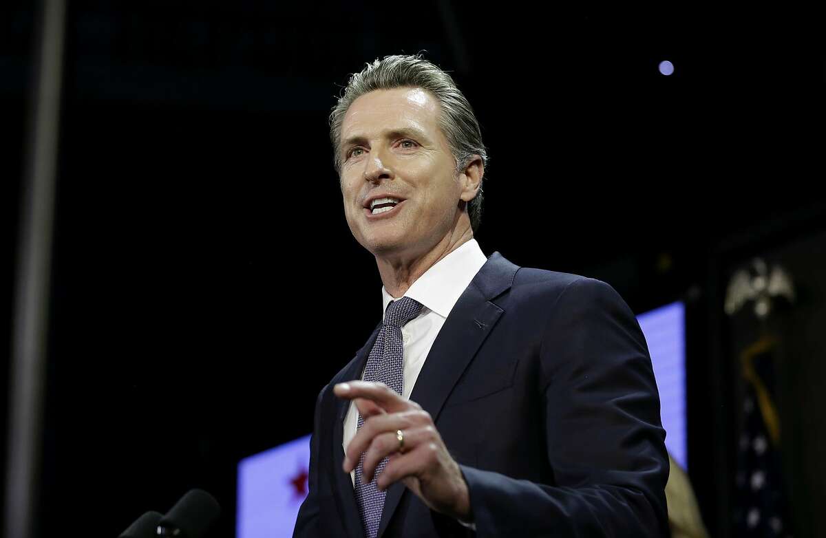 FILE- In this Nov. 6, 2018 file photo, Gavin Newsom, addresses an election night crowd to become the 40th governor of California in Los Angeles. With new Democrats set to take over the governor's mansion across the country, the charter school movement may face a shifting political landscape in a number of key states. (AP Photo/Rich Pedroncelli, File)