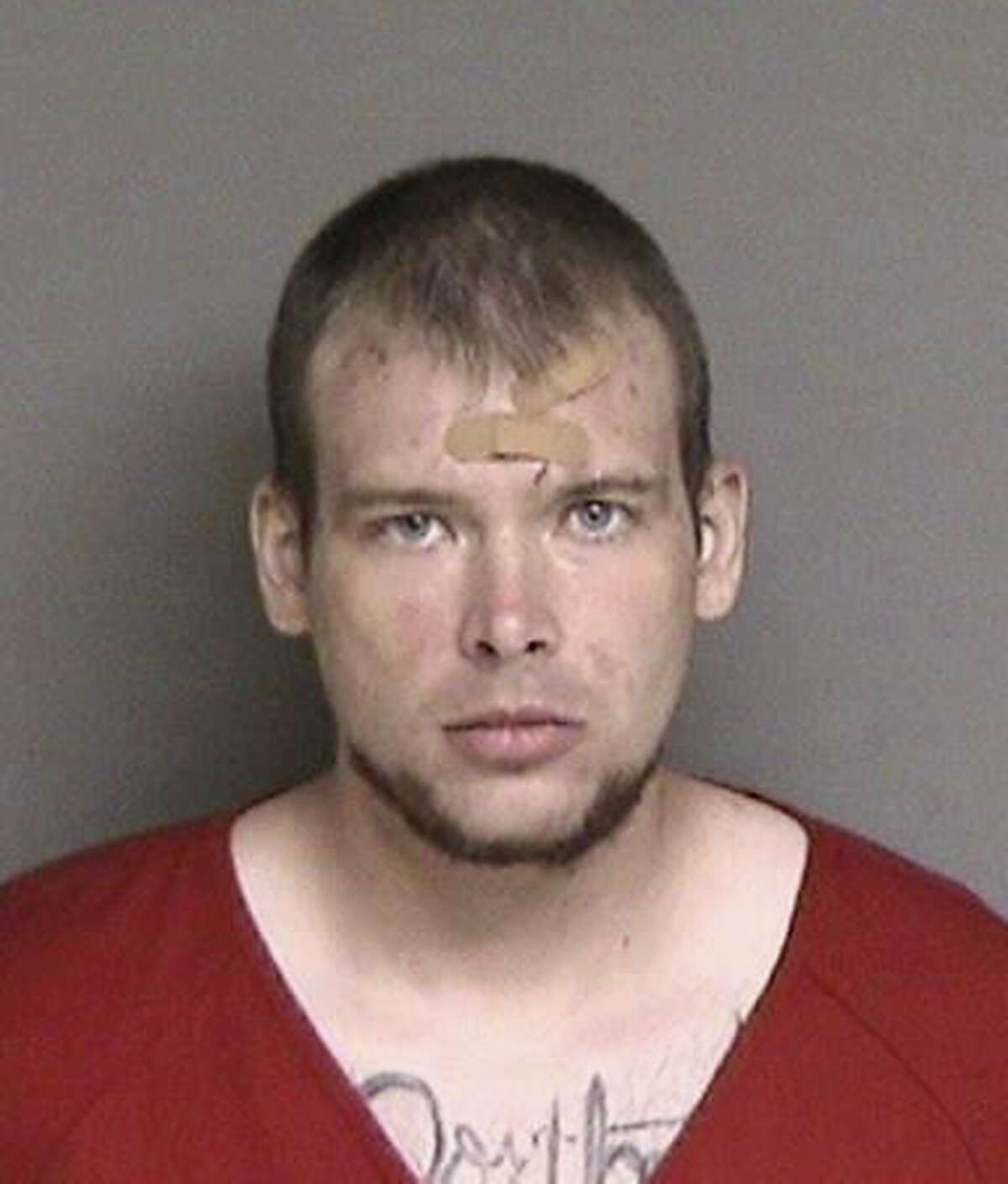 File - In this file photo released July 24, 2018, by the Alameda County Sheriff's Office shows John Lee Cowell. A lawyer for Cowell, a 28-year-old transient charged with stabbing to death 18-year-old Nia Wilson on a commuter train platform says her client is not mentally fit to stand trial. Lawyer Christina Moore on Thursday, Dec. 20, told a judge that Cowell suffers from severe delusions and paranoia. (Alameda County Sheriff's Office via AP, File)