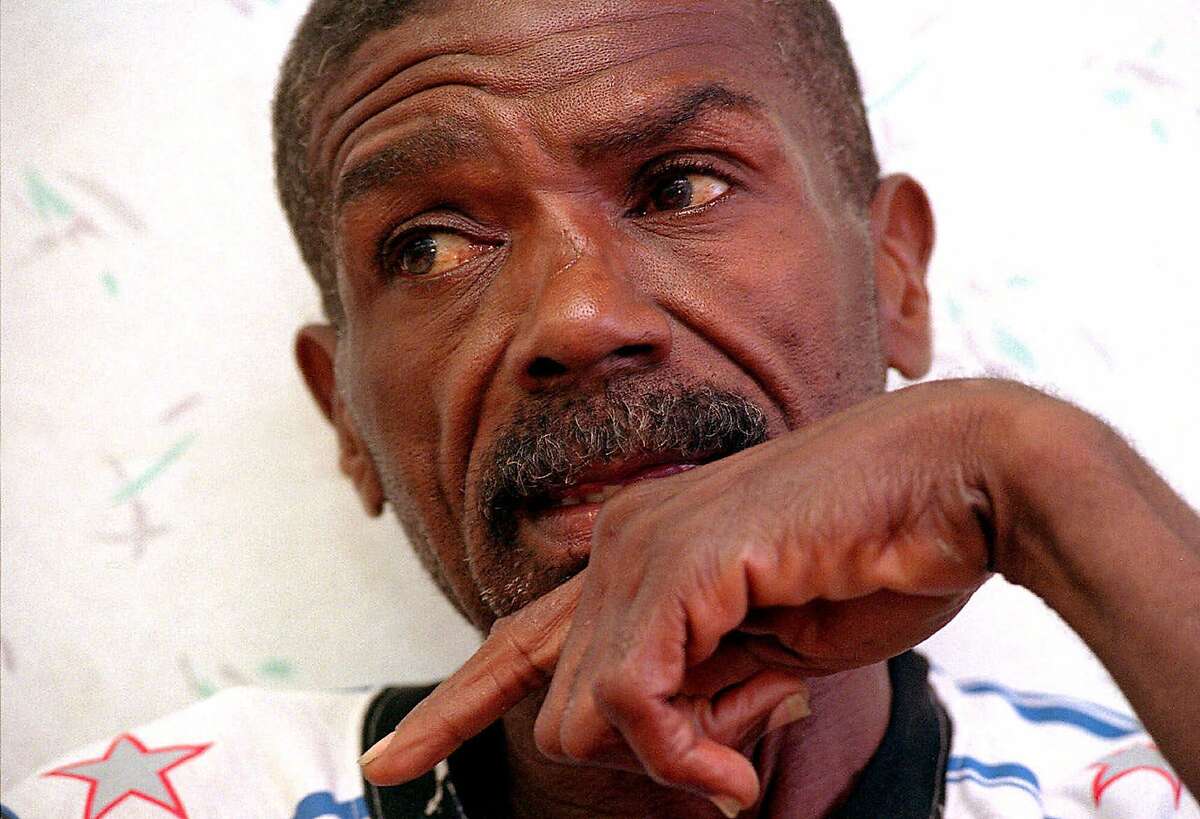 Warren Wells, 57, a former NFL receiver speaks in an interview on Sept. 13, 1999 in Beaumont, Texs. Years ago Wells welcomed with open arms football after football that came spinning from the sky. He never knew that his life would mimic the dying arc of a Hail Mary pass--today he is seen walking the streets in Beaumont's south end and drinking cheap wine. (AP Photo/Beaumont Enterprise Journal/Ron Japp)