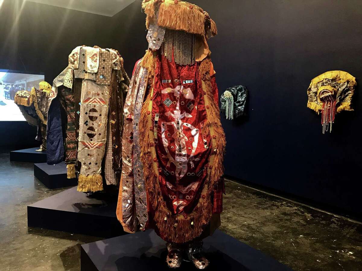 Olaniyi Akindiya (Akirish) has filled the largest gallery of Lawndale Art Center with "Ara Oru Kinkin (Masquaerades Mythology)," an installation based on fantastical costumes for Nigeria's Egungun Masquerade festival.