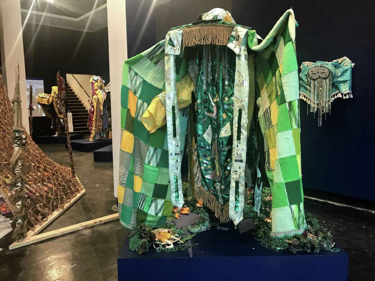 Olaniyi Akindiya (Akirish) has filled the largest gallery of Lawndale Art Center with "Ara Oru Kinkin (Masquaerades Mythology)," an installation based on fantastical costumes for Nigeria's Egungun Masquerade festival.
