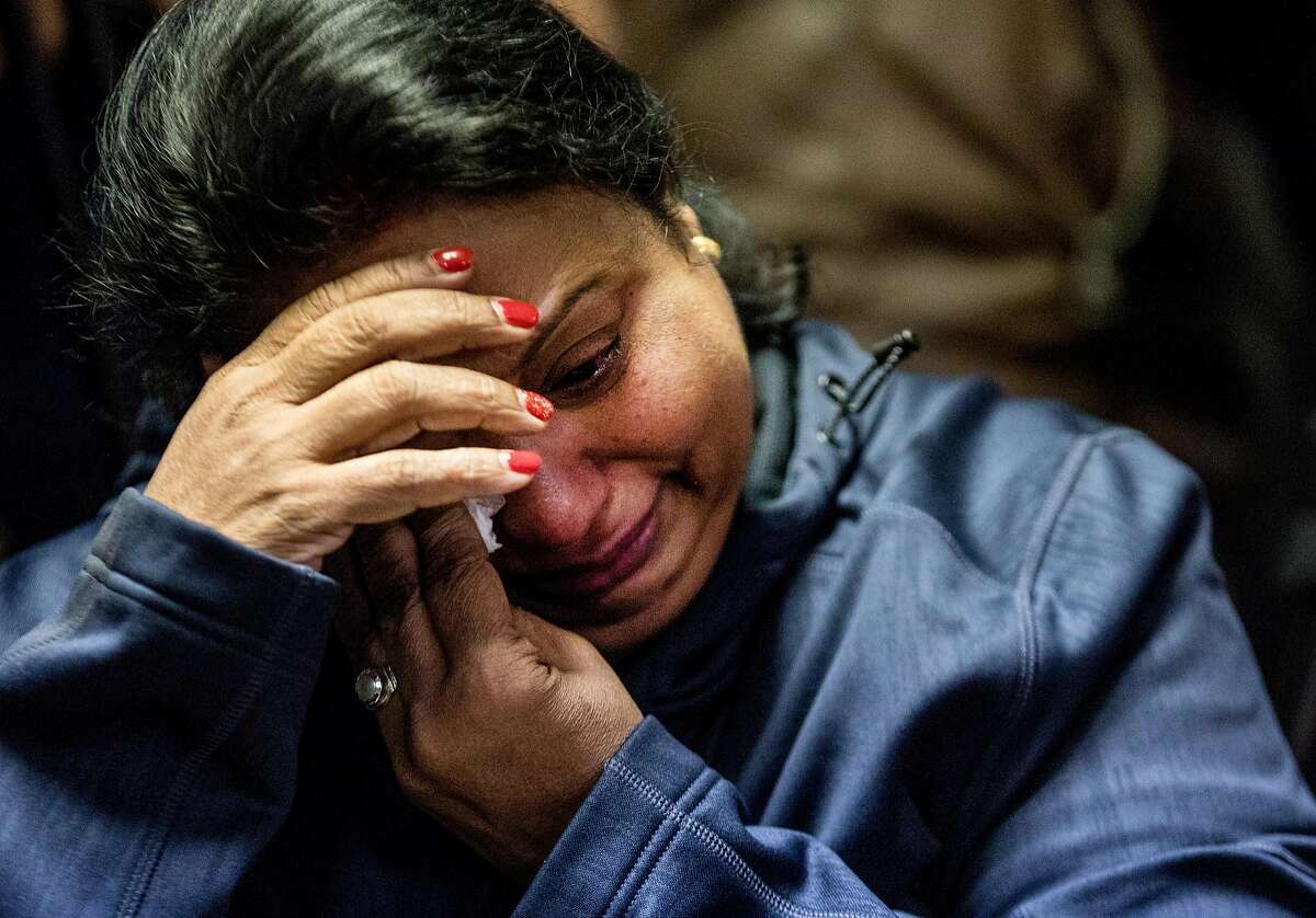 The aunt of Newman Police Officer Ronil Singh who wished not to be named becomes emotional during a press conference held at the Newman Police Department in Newman, Calif. Thursday, Dec. 27, 2018 after Officer Singh was shot and killed early Wednesday morning during a traffic stop.