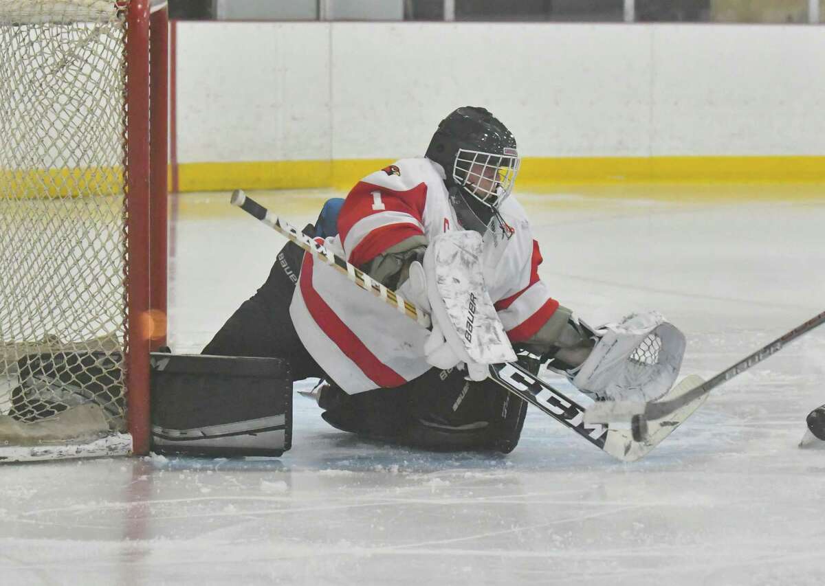 Greenwich goalie Goalie Ben Nash makes a save againstNew Canaan on Dec. 19 at Dorothy Hamil Rink in Greenwich.
