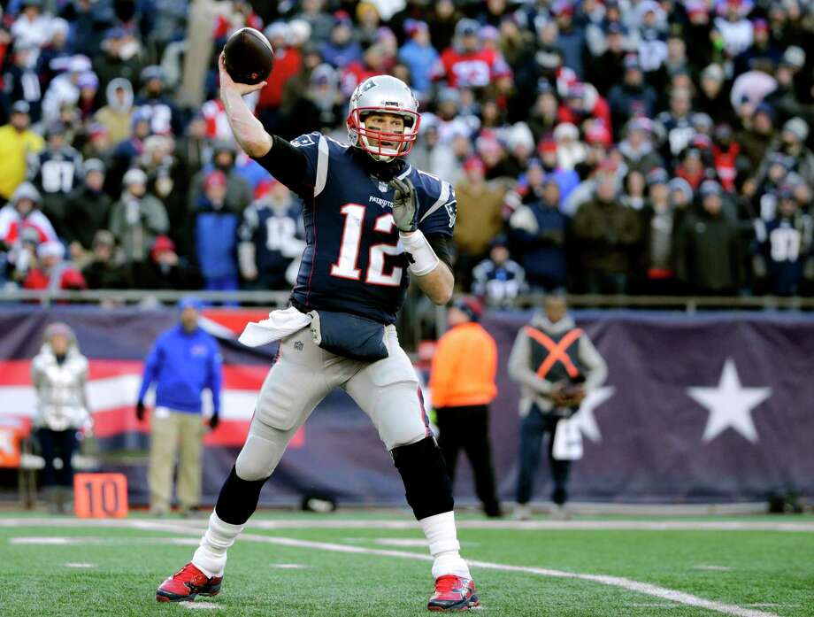 File-This Dec. 23, 2018, file photo shows New England Patriots quarterback Tom Brady passing against the Buffalo Bills during the second half of an NFL football game, in Foxborough, Mass. Brady and the Patriots are the only team in the NFL without a loss at home (7-0). They could complete an undefeated home regular season for the seventh time since 2002 with a sixth straight victory over the Jets. (AP Photo/Elise Amendola, File) Photo: Elise Amendola / Copyright 2018 The Associated Press. All rights reserved