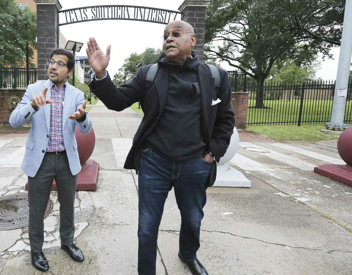 Amar Mohite, Harris County Precinct 1 director of planning and infrastructure, left and Commissioner Rodney Ellis, talk about plans for a new entrance for Texas Southern University that is more pedestrian and cyclist friendly outside the Houston campus on Nov. 19.