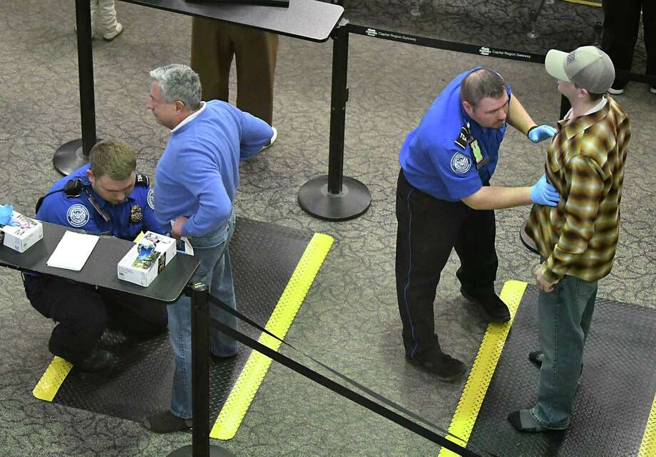 As Shutdown Continues Tsa Staff Work Without Pay Times Union - 