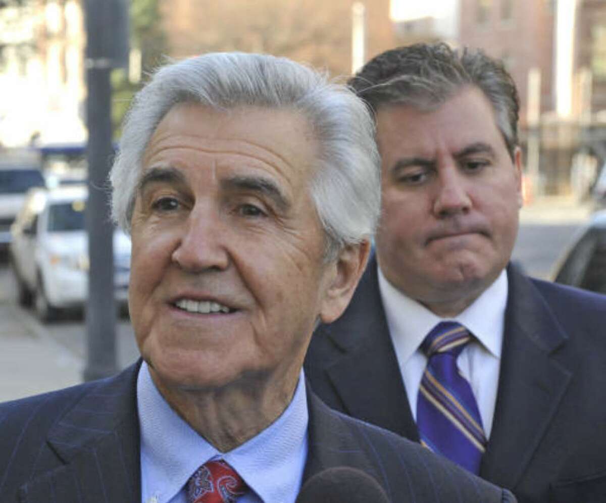 Former state Sen. Joseph L. Bruno with son Ken Bruno behind him, enters the federal courthouse in Albany, New York November 18, 2009 for the continuation of his criminal trial. (Skip Dickstein / Times Union)