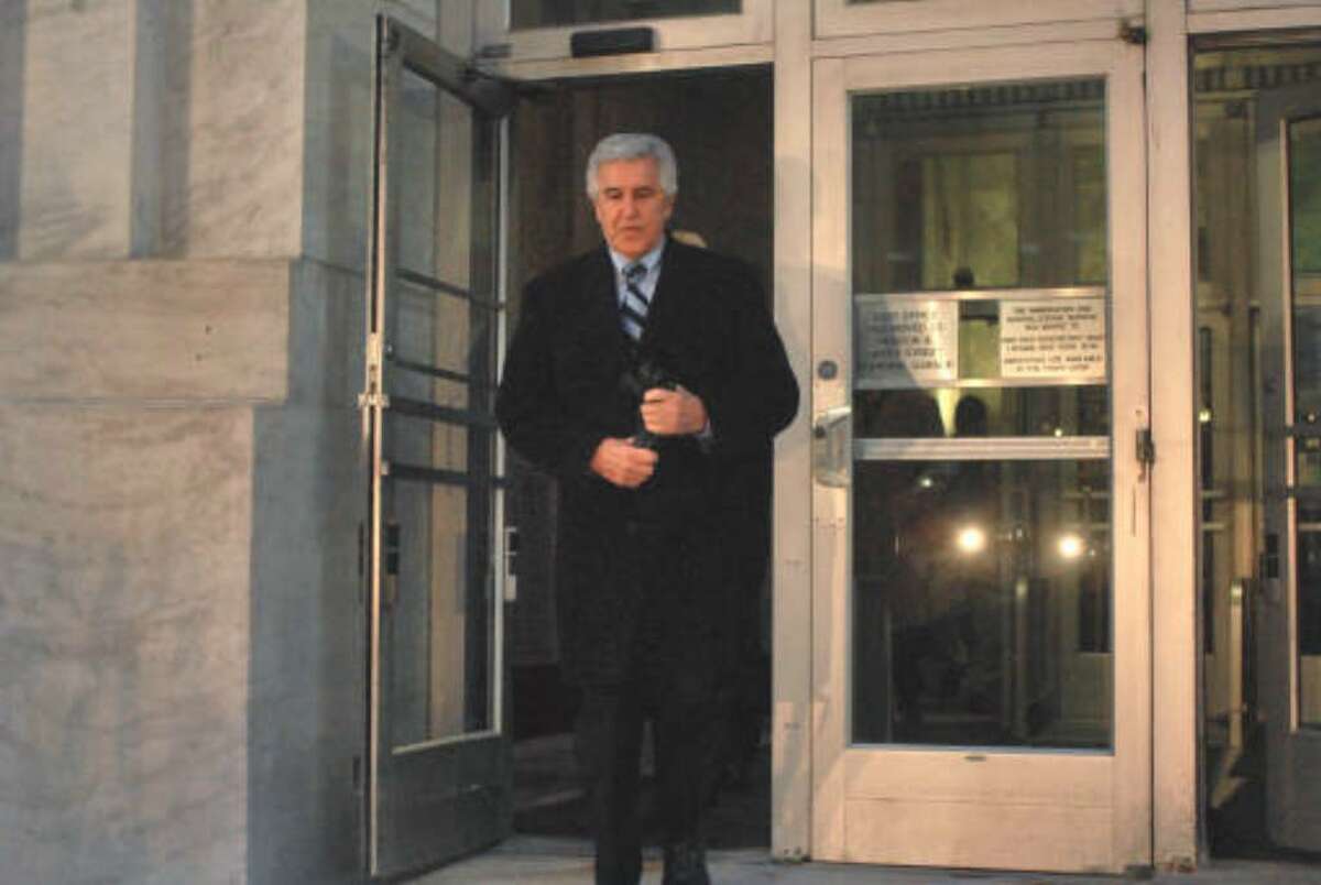 Former Senate Majority Leader Joseph Bruno emerges from the James T. Foley U.S. Courthouse in Albany in December 2009 after being found guilty of two felony charges brought against him in a federal corruption case. Bruno was acquitted on 5 other charges. (Philip Kamrass / Times Union)