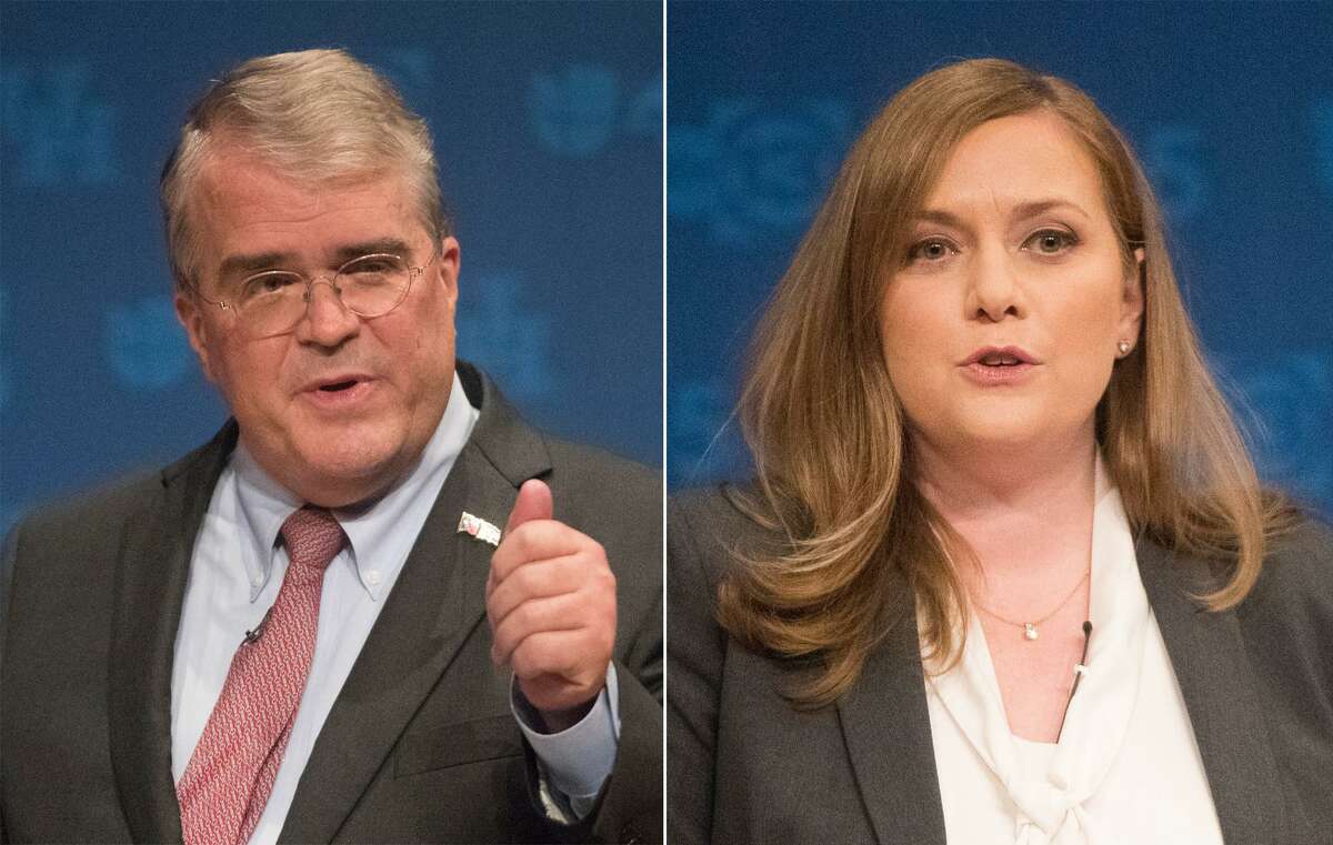 Republican U.S. Rep. John Culberson debates opponent Democrat Lizzie Pannill Fletcher at the University of Houston, Sunday, Oct. 21, 2018, in Houston. Both of them are running for U.S. Congress in Houston's Congressional District 7.