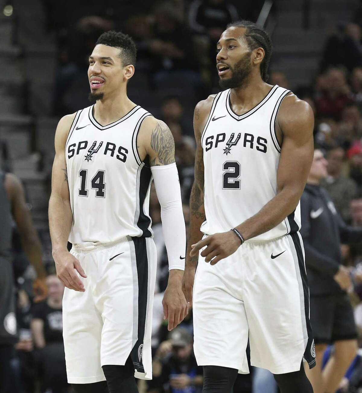 Spurs' Danny Green (14) and Kawhi Leonard (02) appear together in a game against the Brooklyn Nets at the AT&T Center on Tuesday, Dec. 26, 2017. Reports emerged on Wednesday, July 18, 2018 that both Leonard and Green were traded to the Toronto Raptors in a trade for DeMar DeRozan, Jakob Poeltl and a future draft picks. (Kin Man Hui/San Antonio Express-News)