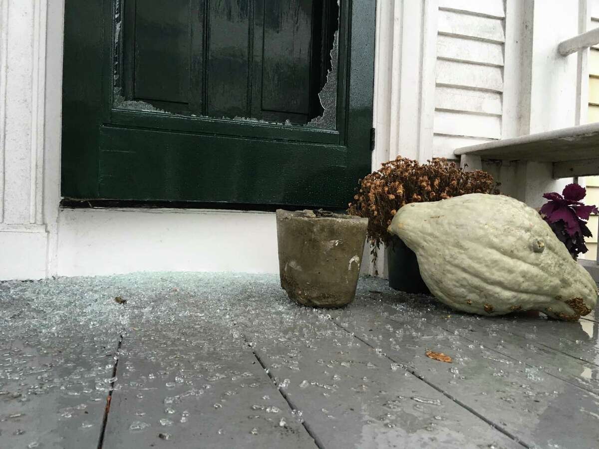 Glass on a door to a North Water Street home in Edgartown, Mass., is shattered following a vandalism spree allegedly committed by Greenwich teens on Martha's Vineyard last week.