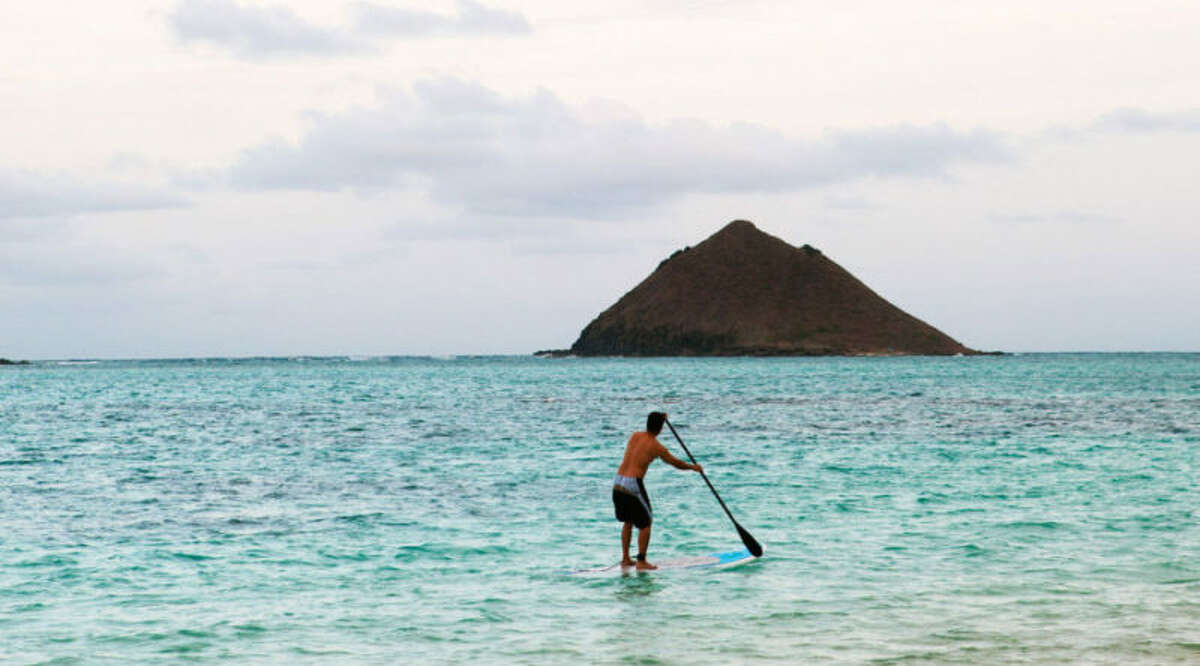 Oahu, HI  Volcanic landscapes, dramatic coastlines, and turquoise waters make wellness the default setting on this island paradise. Paddleboard Kailua Beach Park, hike Maunawili Falls Trail, grab a pitaya bowl from Da Cove Health Bar & Café, surf the North Shore with Hans Hedemann Surf School and aloha your worries away.