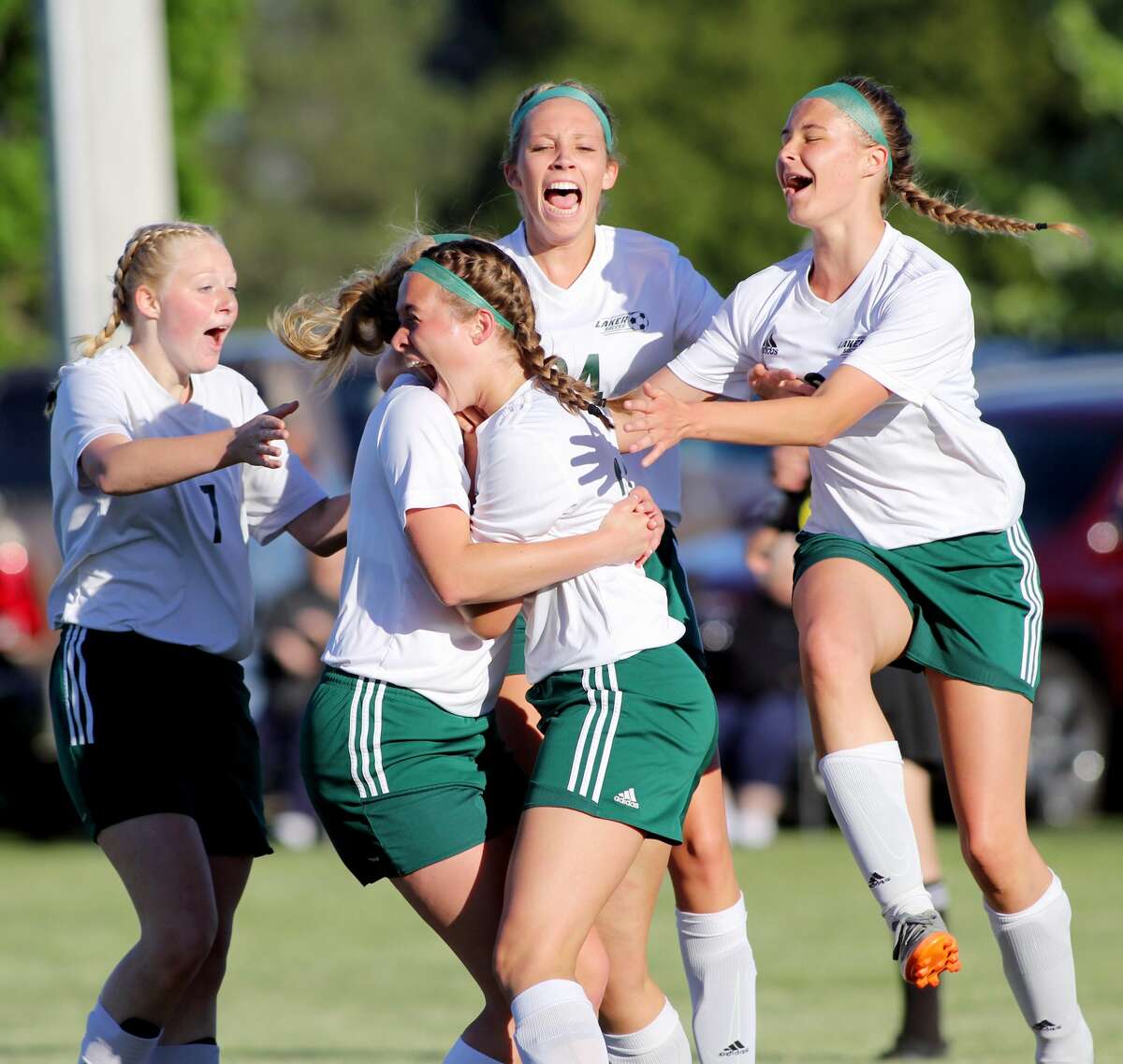 EPBP soccer player Halle Keim celebrates with her teammates after scoring the game-winning goal in the Division 4 district championship game. 