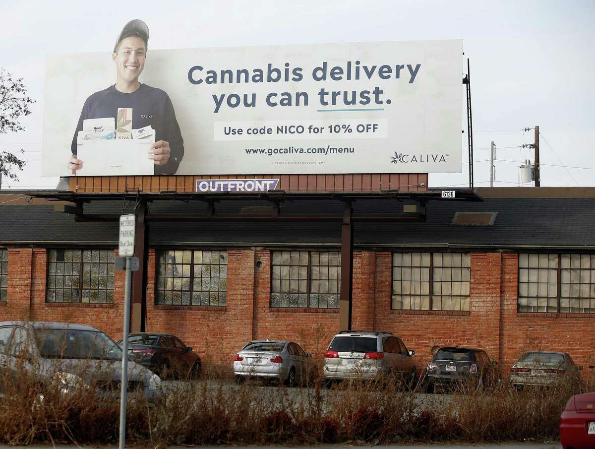 Caliva cannabis delivery billboard on Montgomery Street and Autumn Street is photographed in San Jose, Calif., on Nov. 20, 2018. Uber, Lyft drivers are fleeing to become marijuana-delivery drivers in the new in-demand job in the on-demand economy. Caliva employs more than a hundred drivers.