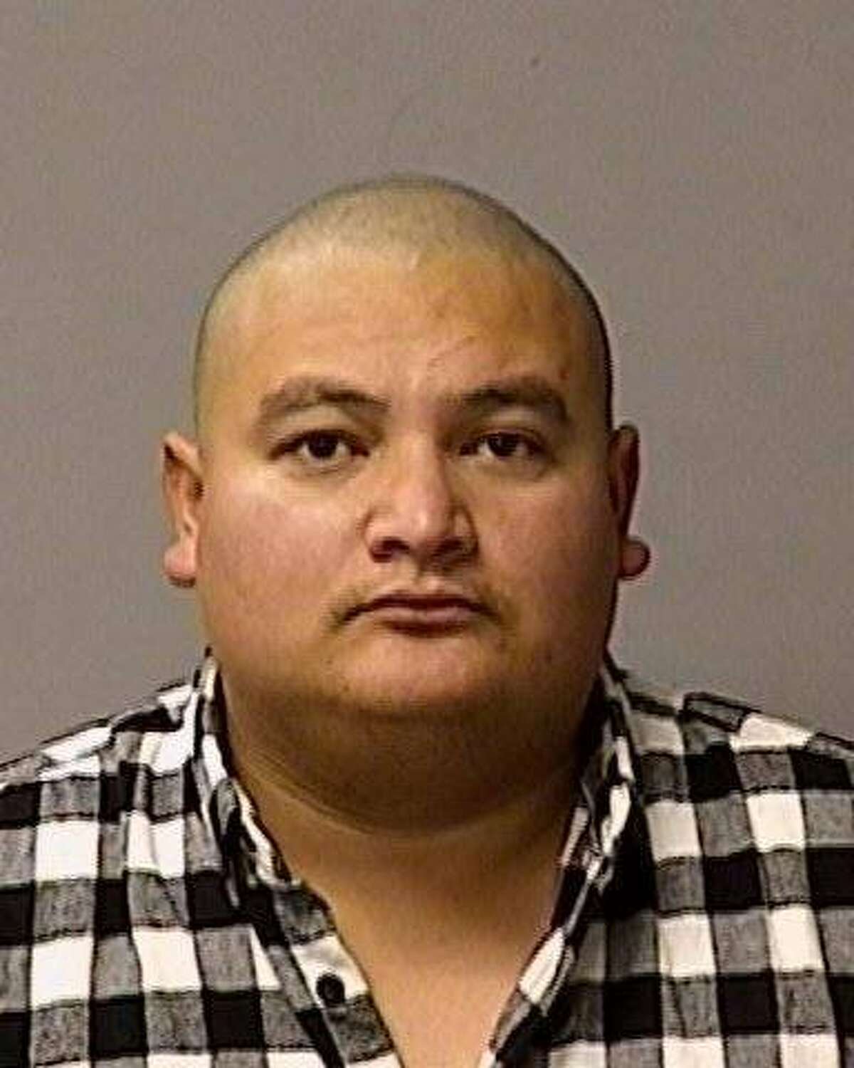 Gustavo Perez Arriaga, 32, pictured in a booking photo days after he was suspected of fatally shooting Newman police Cpl. Ronil Singh during a traffic stop on Christmas morning. He was arrested on Friday in the 8200 block of Brooks Lane just south of Bakersfield in the town of Lamont (Kern County).