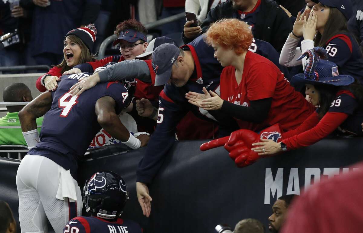 PHOTOS: A look at the Texans' win over the Jaguars on Sunday Houston Texans quarterback Deshaun Watson (4) jumps up into the stands after his touchdown during the second quarter of an NFL football game at NRG Stadium, Sunday, Dec. 30, 2018, in Houston.