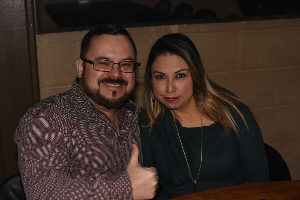 Abel and Erika Perez pose for a photo during La Mafia and Gary Hobbs performance.