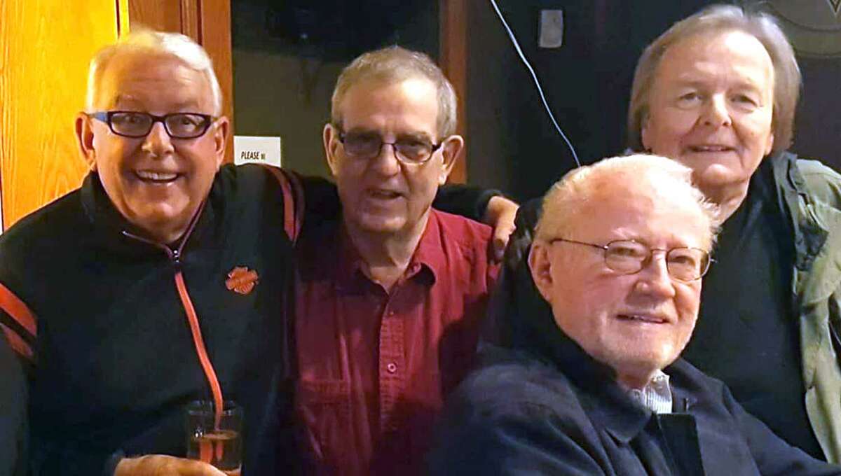 Longtime columnist and author Rick Anderson, far right, died at 77 years old on Christmas Eve.
