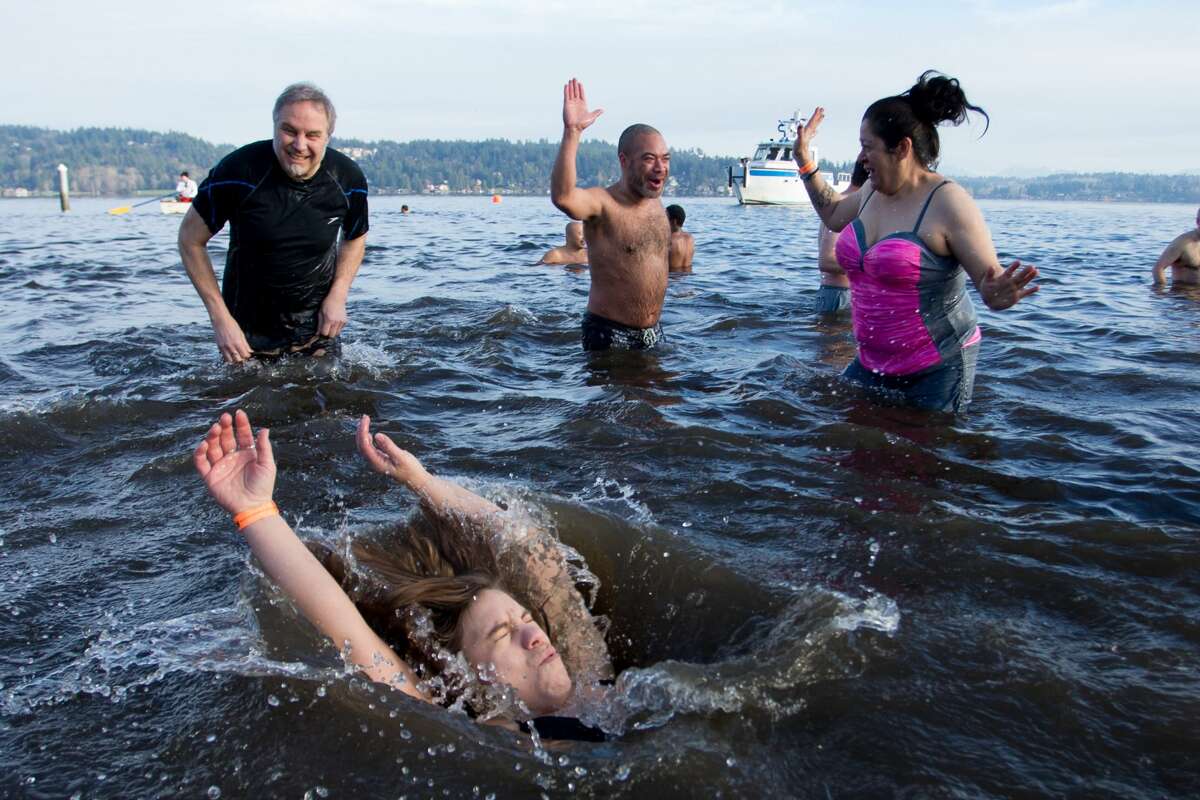 Hundreds of brave souls participate in the 17th annual Matthew's Beach Polar Plunge, Tuesday, January 1, 2019.