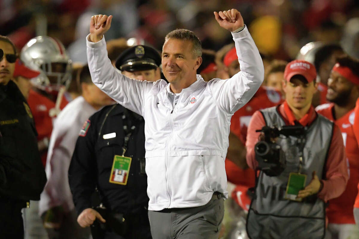 Ohio State coach Urban Meyer celebrates at the end of the team's 28-23 win over Washington during the 2019 Rose Bowl in Pasadena, Calif.