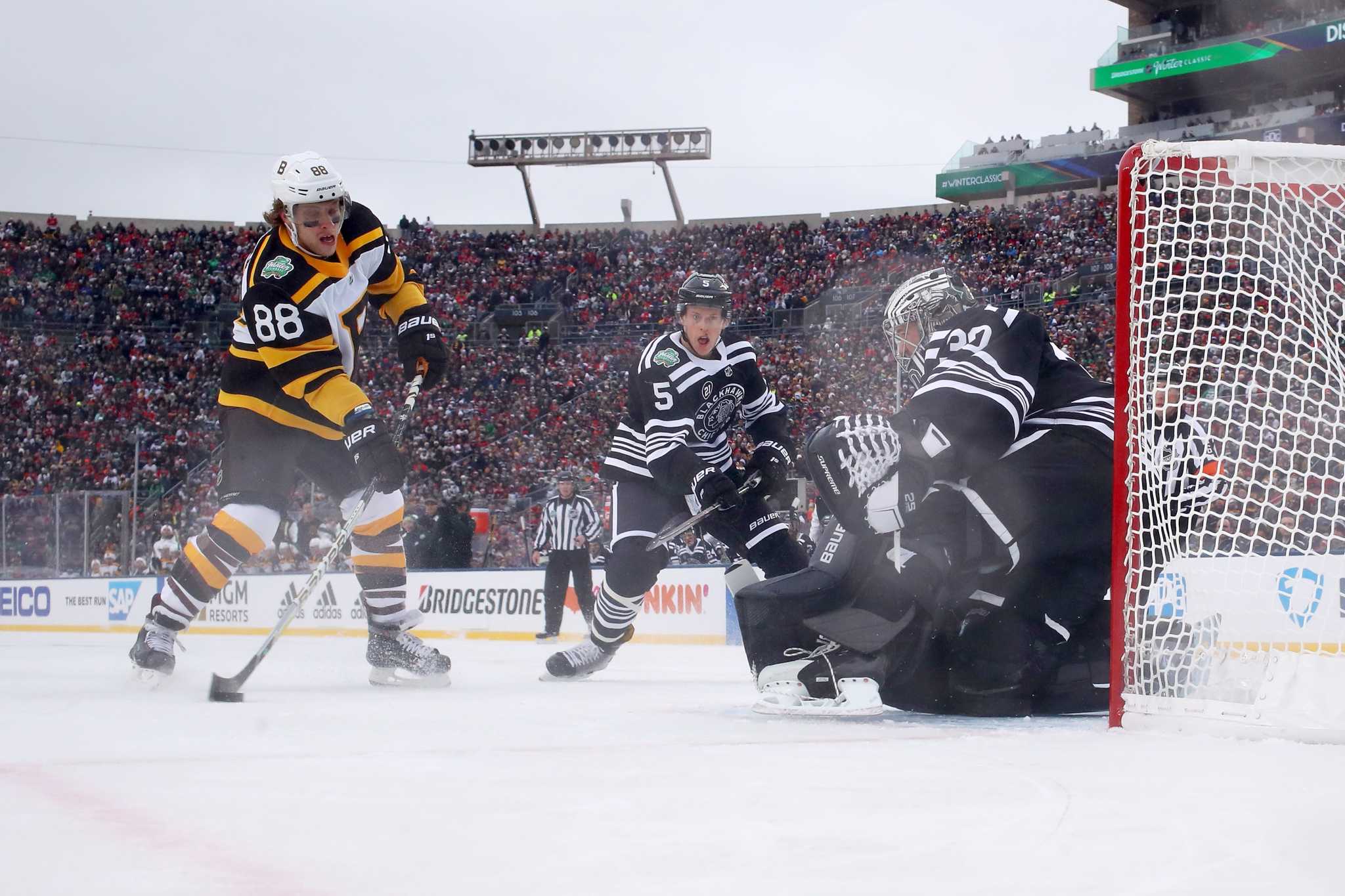 NHL Winter Classic: David Pastrnak, Bruins beat Blackhawks 4-2 at