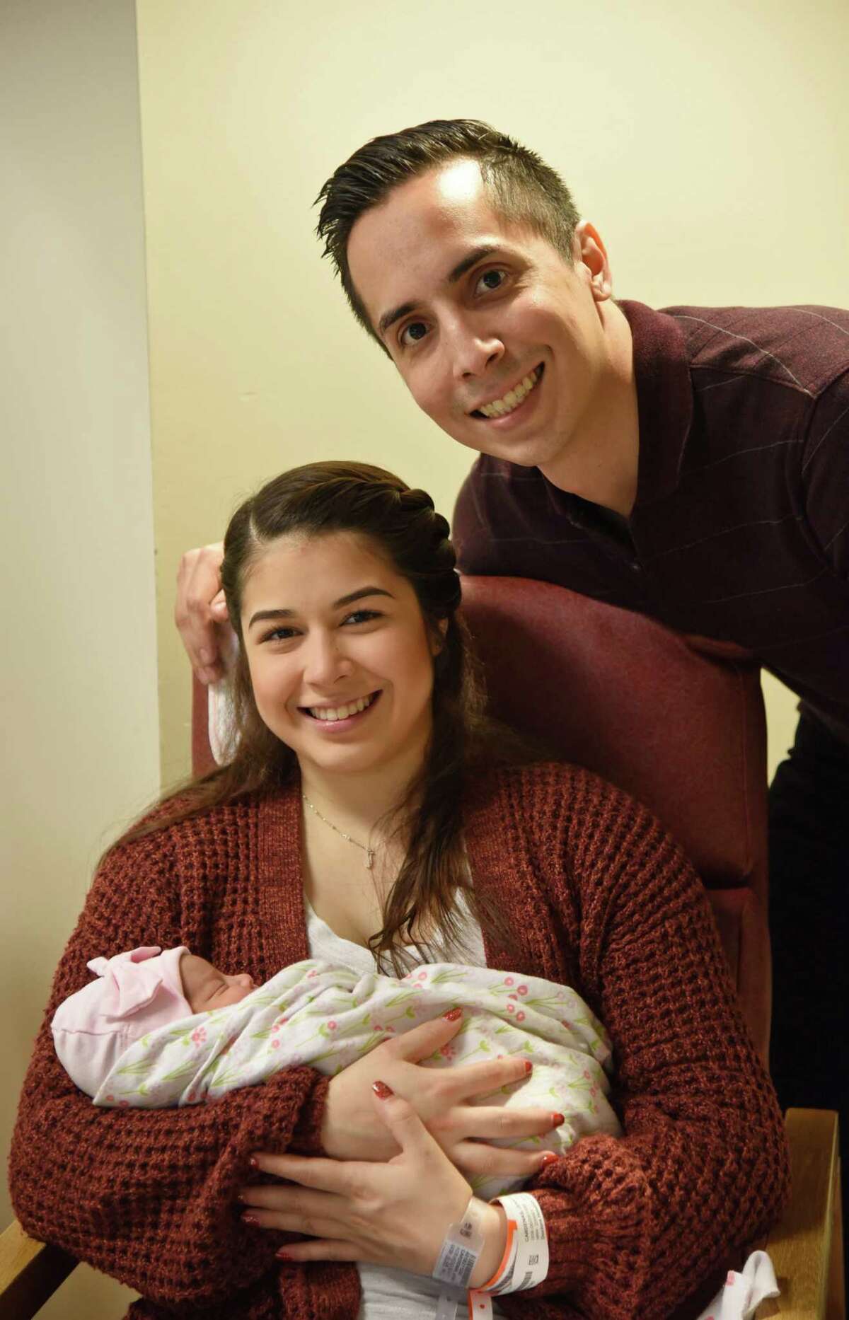 Serena Jade Gallegos, Doctors Hospital 2019’s New Year baby, is held by mother and father Jennyfer Cardenas and Pete Gallegos III,Tuesday, January 1, 2019.