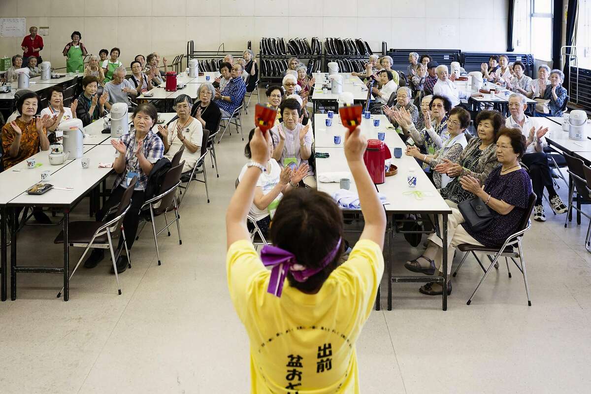 FILE -- Attendees of a monthly lunch event for tenants who live alone, at a huge government apartment complex -� called danchi � in Tokiwadaira, Japan, July 25, 2017. The global population is rapidly aging, the birthrate is declining, the pension shortfall is growing. Future retirees are on shaky ground. (Ko Sasaki/The New York Times)