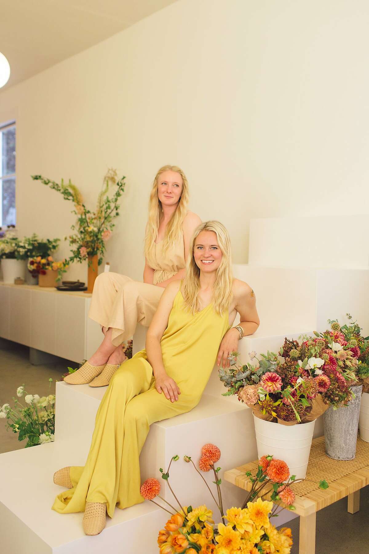 Gena Winter (left) and Aubriana MacNiven are the co-owners of Marigold, a flora shop in the Mission District that has become a popular events space as well.