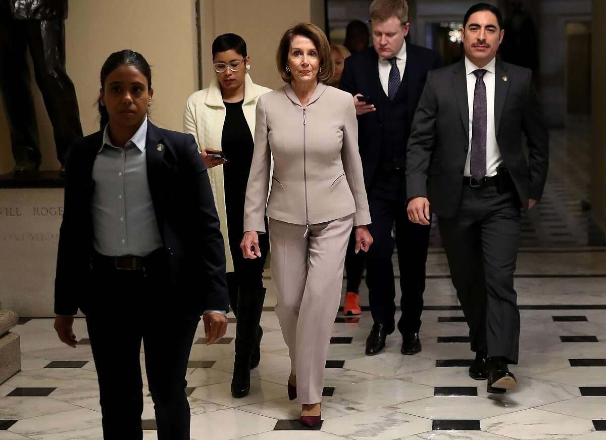 WASHINGTON, DC - JANUARY 02: House Minority Leader Nancy Pelosi (D-CA) walks to an interview at the U.S. Capitol on January 02, 2019 in Washington, DC. Pelosi, who is scheduled to become the next Speaker of the House tomorrow, will meet with other leaders of Congress and U.S. President Donald Trump at the White House later today to discuss border security and ending the partial shutdown of the U.S. government. (Photo by Win McNamee/Getty Images)