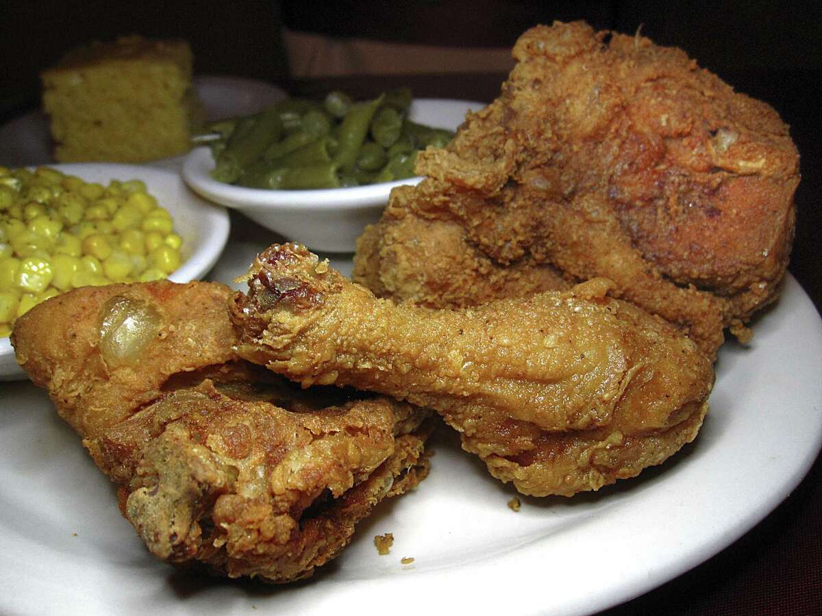 Fried chicken with cornbread and sides of corn and green beans from Mrs. Kitchen Soul Food Restaurant