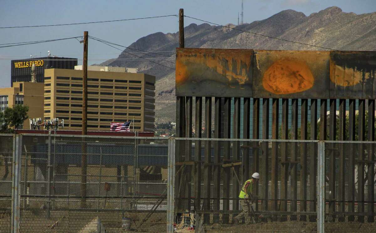 (FILES) In this file photo taken on September 26, 2018 workers in El Paso Texas, in the US, replace a section of the Mexico-US border fence next to the international border bridge "Paso del Norte" as seen from Ciudad Juarez, in Chihuahua state, Mexico. - The US Senate will vote on an emergency short-term spending bill introduced by Republicans on December 19, 2018 that averts a government shutdown, but does not include funding that President Donald Trump sought for a US-Mexico border wall.Senate Majority Leader Mitch McConnell told colleagues that the measure "will provide the resources necessary to continue normal operations through February 8th," avoiding a potentially crippling closure of some federal offices over next week's coming Christmas holiday. (Photo by HERIKA MARTINEZ / AFP)HERIKA MARTINEZ/AFP/Getty Images
