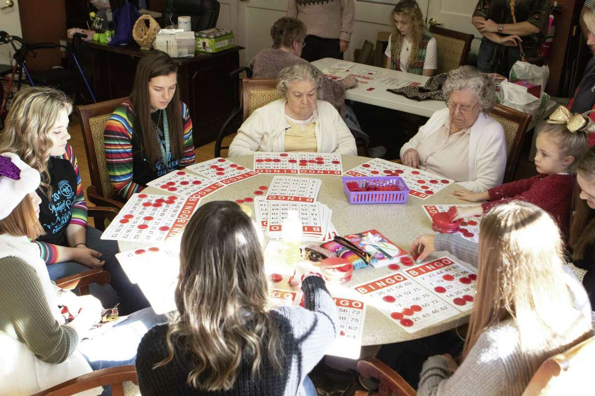 2019 Fair Queen candidates and Elmcroft of Rivershire play Bingo on Friday, Dec. 21, 2018 at Elmcroft of Rivershire in Conroe.