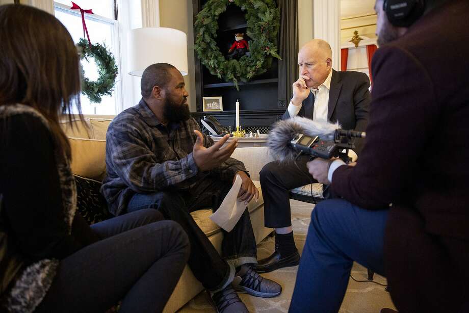 California Gov. Jerry Brown (right) is interviewed by Earlonne Woods and the Ear Hustle podcast team on Thursday, Jan. 3, 2019, in Sacramento, Calif. Photo: Santiago Mejia / The Chronicle