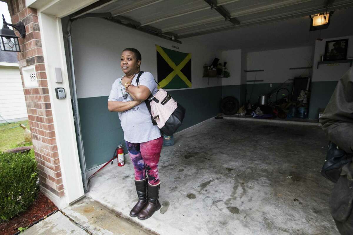 Jocelyn Wolford waits at her home for her vehicle to arrive so she can go and order t-shirt with the words "Justice for Jazmine," Thursday, Jan. 3, 2019, near C.E. King area northeast of Houston. Wolford, who doesn't know Jazmine Barnes, a seven-year-old girl who was shot, said she felt deeply hurt by the death and has been thinking about it since 4:45 a.m.