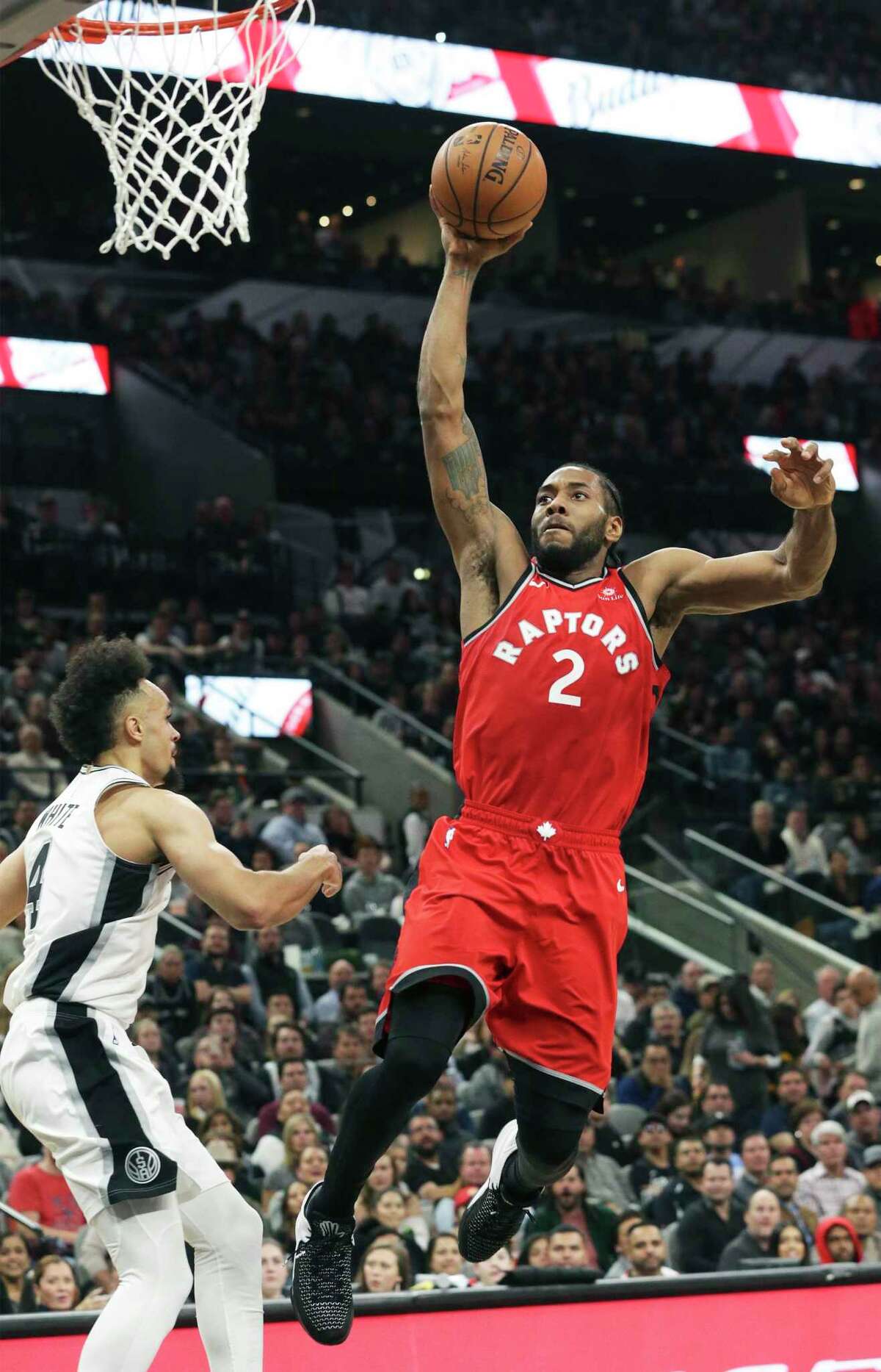 Kawhi Leonard goes up for a slam in the second half as the Spurs host the Raptors at the AT&T Center on January 3, 2019.