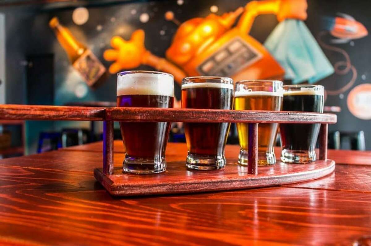 A flight of craft beers at Cosmic Brewery.