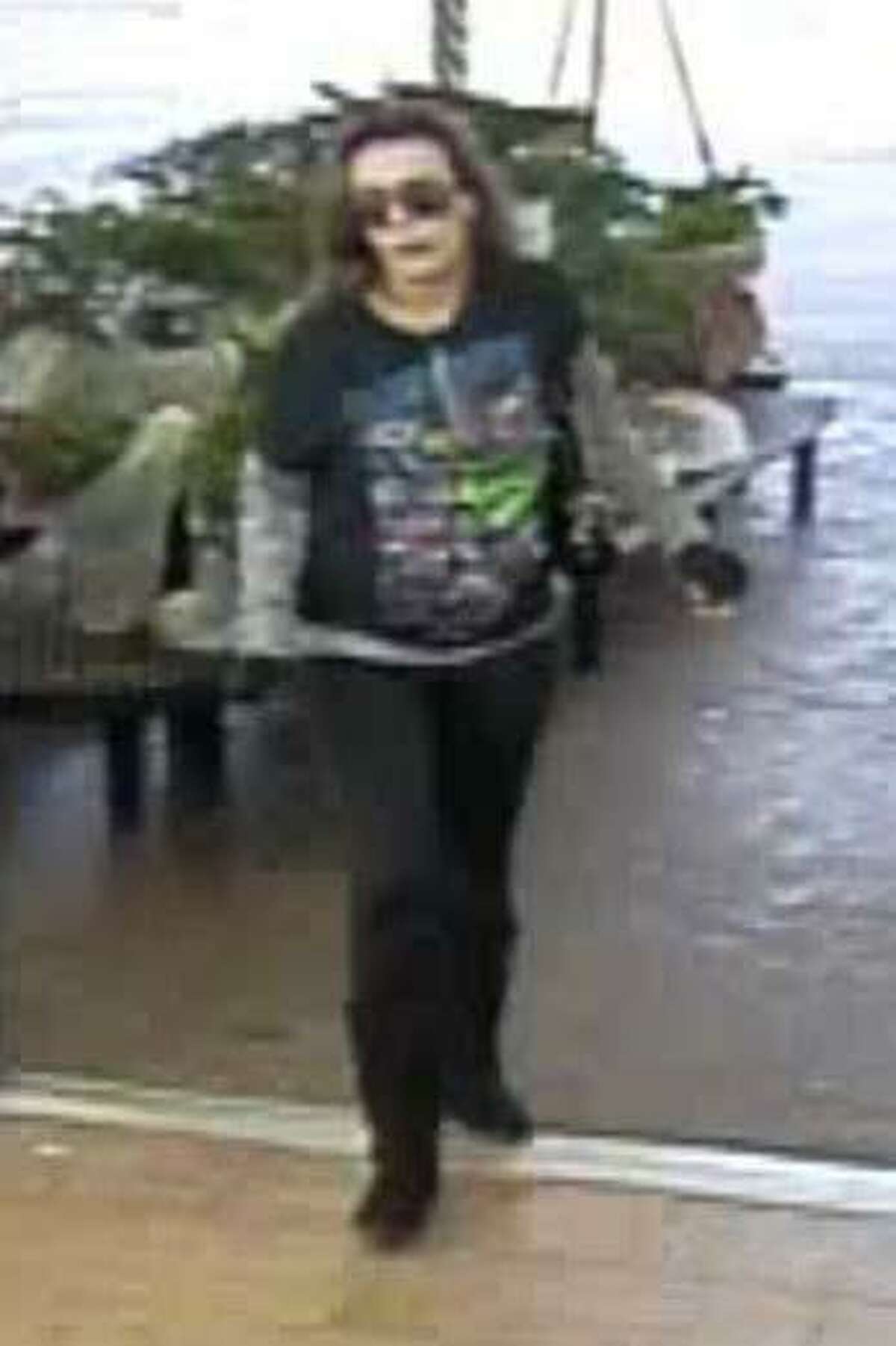 A shoplifting suspect is seen Dec. 6 on surveillance camera at the Woodlands Parkway Walmart in Spring.