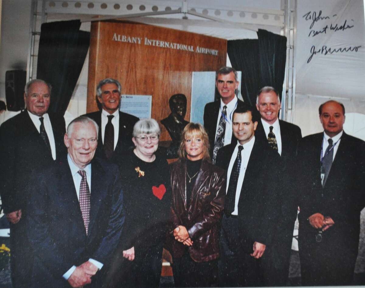 Left to right: Airport Authority CEO John Egan, Southwest Airlines co-founder and CEO Herb Kelleher, Senate Majority Leader Joseph L. Bruno, Southwest Corporate Secretary Colleen Barrett, Albany County Airport Authority Administrative Assistant Ginger Olthoff, Chief Financial Officer Dwight Hadley, Chief Operating Officer John O'Donnell, Airport Authority Counsel Peter Stuto, and airport spokesman Doug Myers.