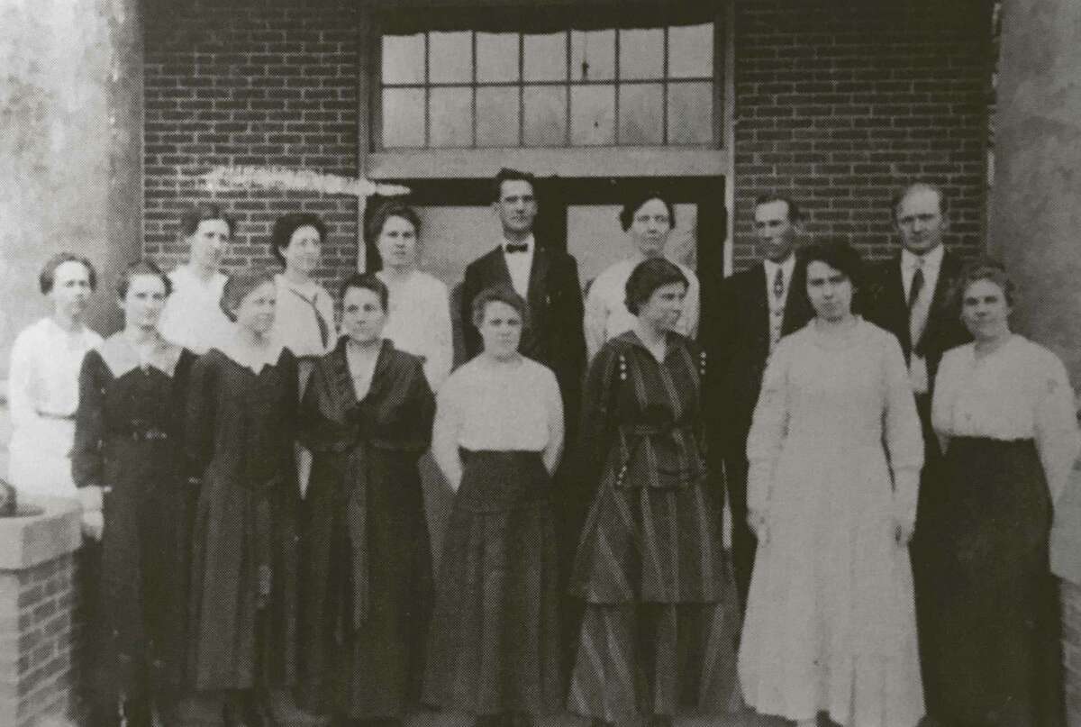 Clara Knight is pictured at left with a group of teachers from Conroe High School. Also pictured are Hulon N. Anderson and Anson Runyan, both who now have schools in Conroe ISD named for them.