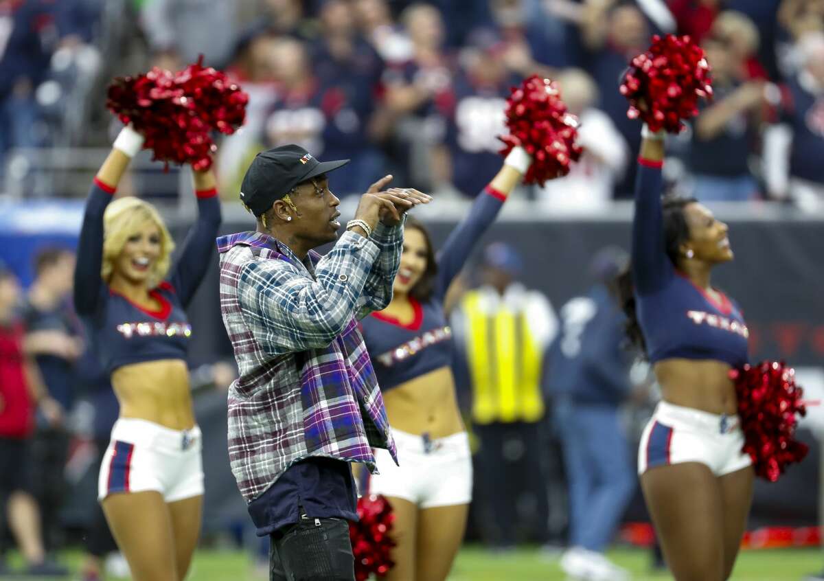 Houston hip hop artist Travis Scott is welcomed to the field before the AFC Wild Card playoff game between the Texans and the Indianapolis Colts on Jan. 5, 2019.