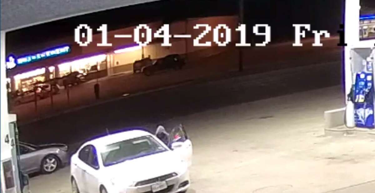 Surveillance video shows the woman walking toward the vehicle at the gas station where King Jay Hernandez was taken on Jan. 4, Friday.
