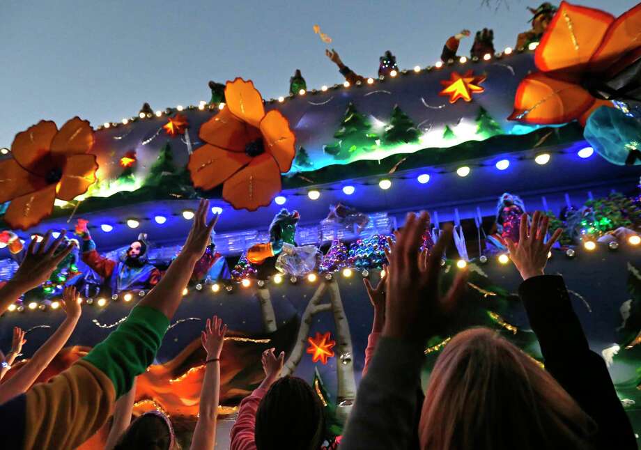 FILE - In this Feb. 25, 2017 file photo, revelers scream for beads during the Krewe of Endymion Mardi Gras parade in New Orleans. The rest of America may be winding down from Christmas and New Year’s. But in New Orleans, another party is about to get started. Mardi Gras season kicks off Sunday, Jan. 6, 2019. (AP Photo/Gerald Herbert, File) Photo: Gerald Herbert / Copyright 2017 The Associated Press. All rights reserved.