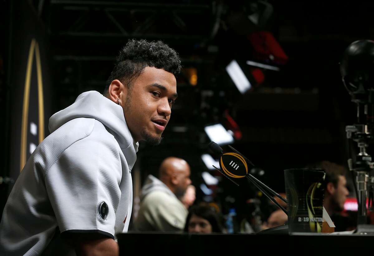 Alabama Crimson Tide quarterback Tua Tagovailoa fields questions from sports reporters at the College Football Playoff National Championship media day at the SAP Center in San Jose, Calif. on Saturday, Jan. 5, 2019.