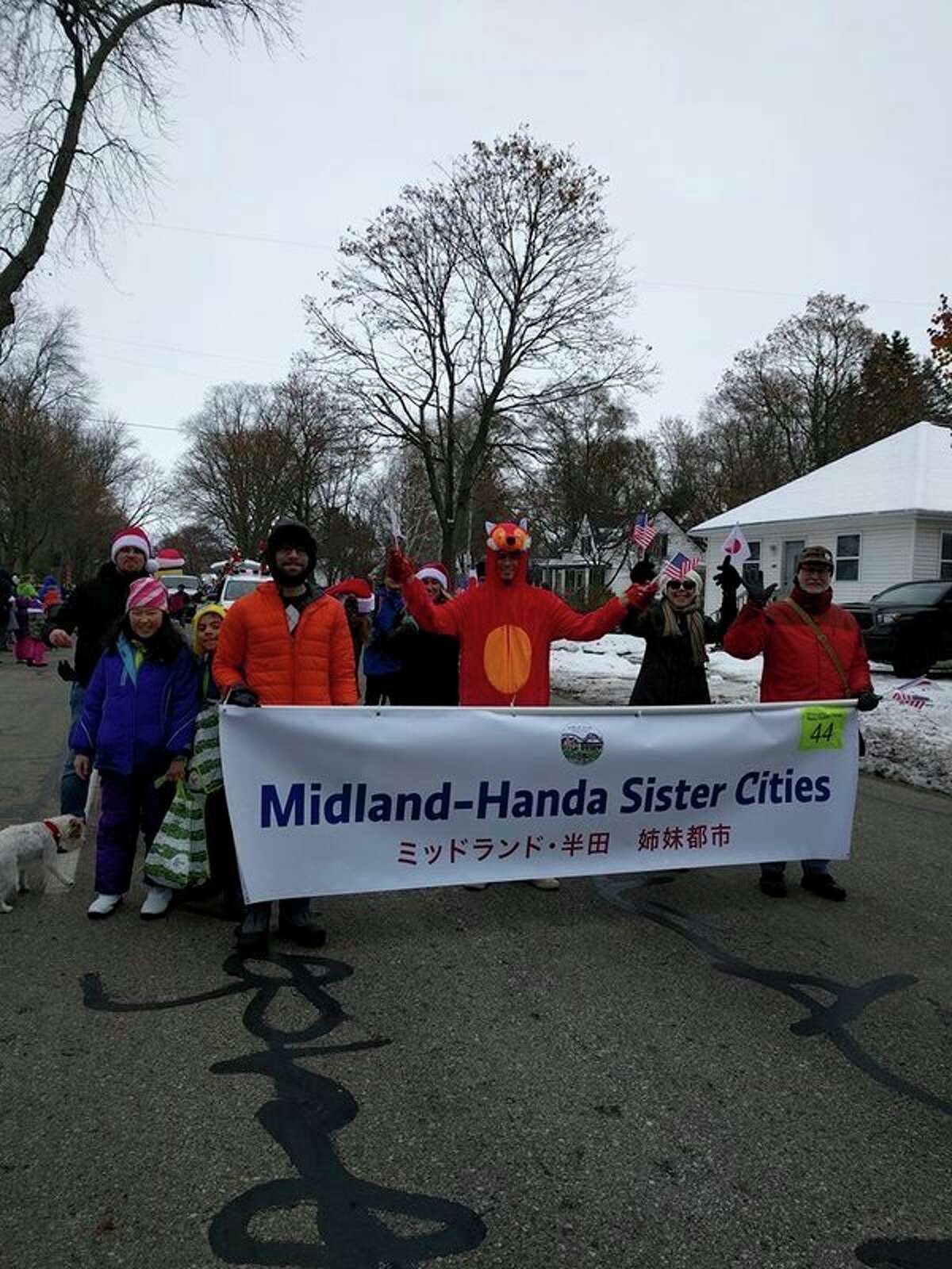 Members of the Midland-Handa Sister City committee march in Midland's Santa Parade on Nov. 27, 2018. (Photo courtesy of John Metcalf)
