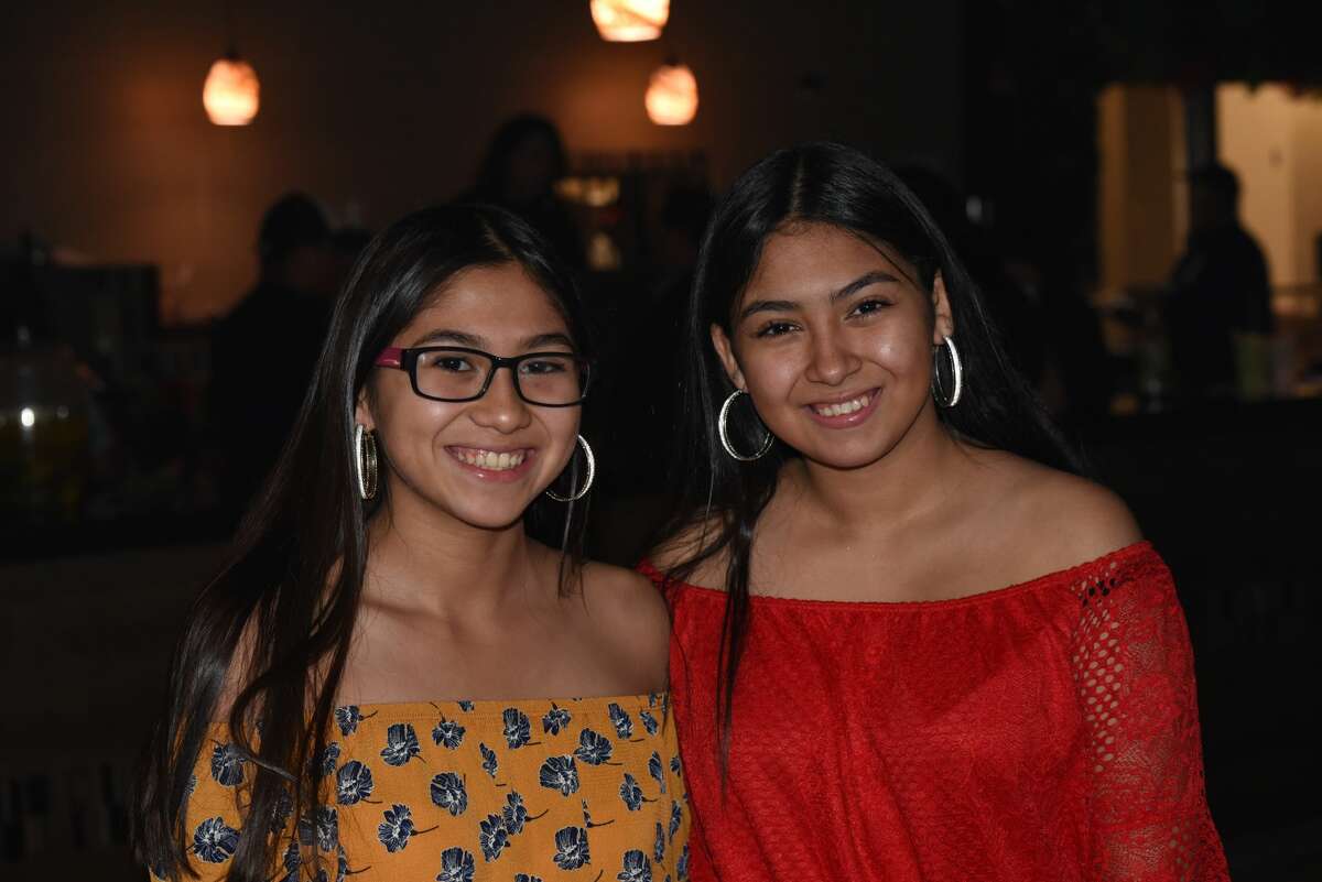 Kiana and Kristina Saucedo pose for a photo during the Rudy Gonzalez Victory Dance.
