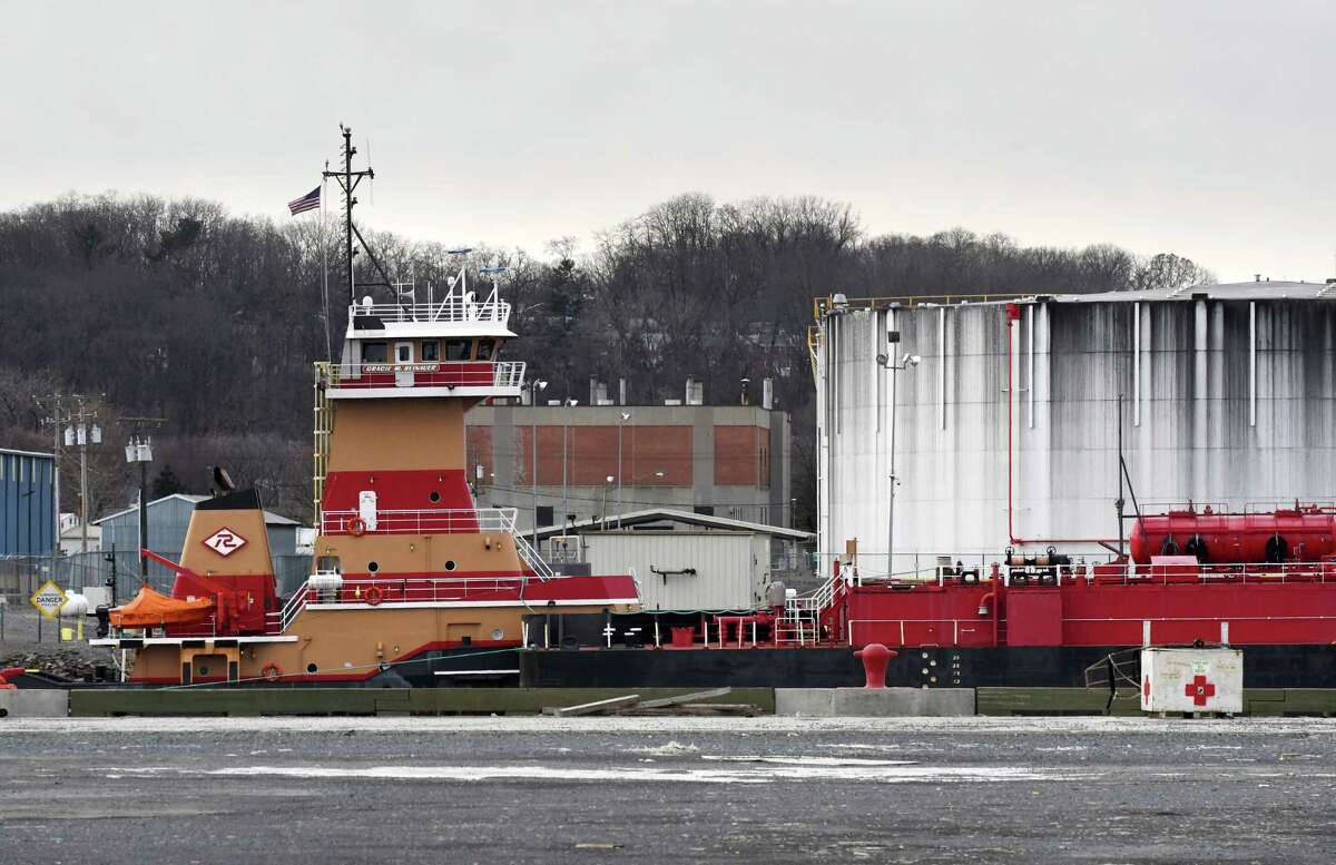 A fuel barge and tug are docked at the Port of Albany, seen from Rensselaer, on Monday, Jan. 7, 2019, in Albany, N.Y. (Will Waldron/Times Union)
