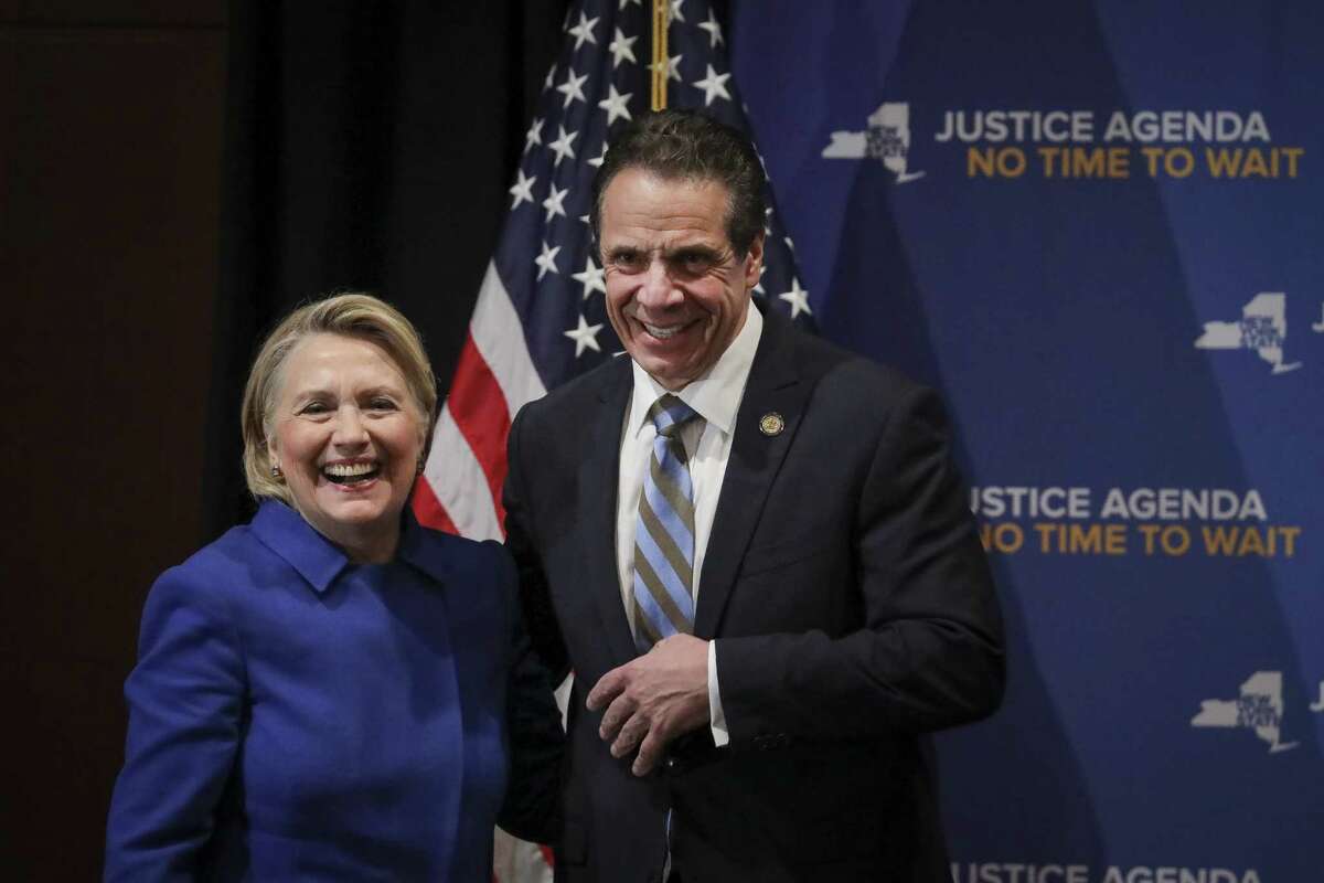 NEW YORK, NY - JANUARY 7: (L-R) Former Secretary of State Hillary Clinton and New York Governor Andrew Cuomo smile at the end of an event to discuss reproductive rights at Barnard College, January 7, 2019 in New York City. The two Democrats shared the stage to promote the Reproductive Health Act in New York, which Cuomo wants the State Legislature to pass in their first 30 days. Under New York's current law, abortions after 24 weeks are illegal unless its necessary to save the woman's life.