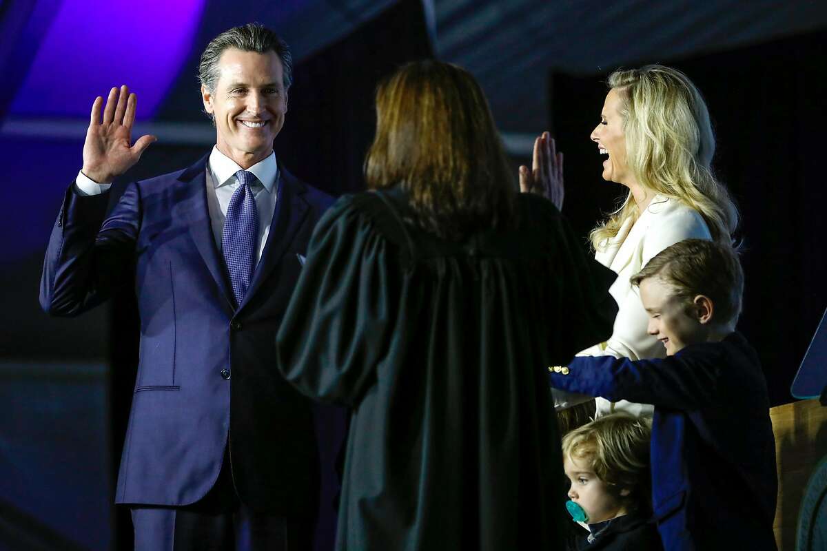 Governor-elect Gavin Newsom takes the oath of office during his inauguration ceremony in Sacramento, California, on Monday, January 7th, 2019.