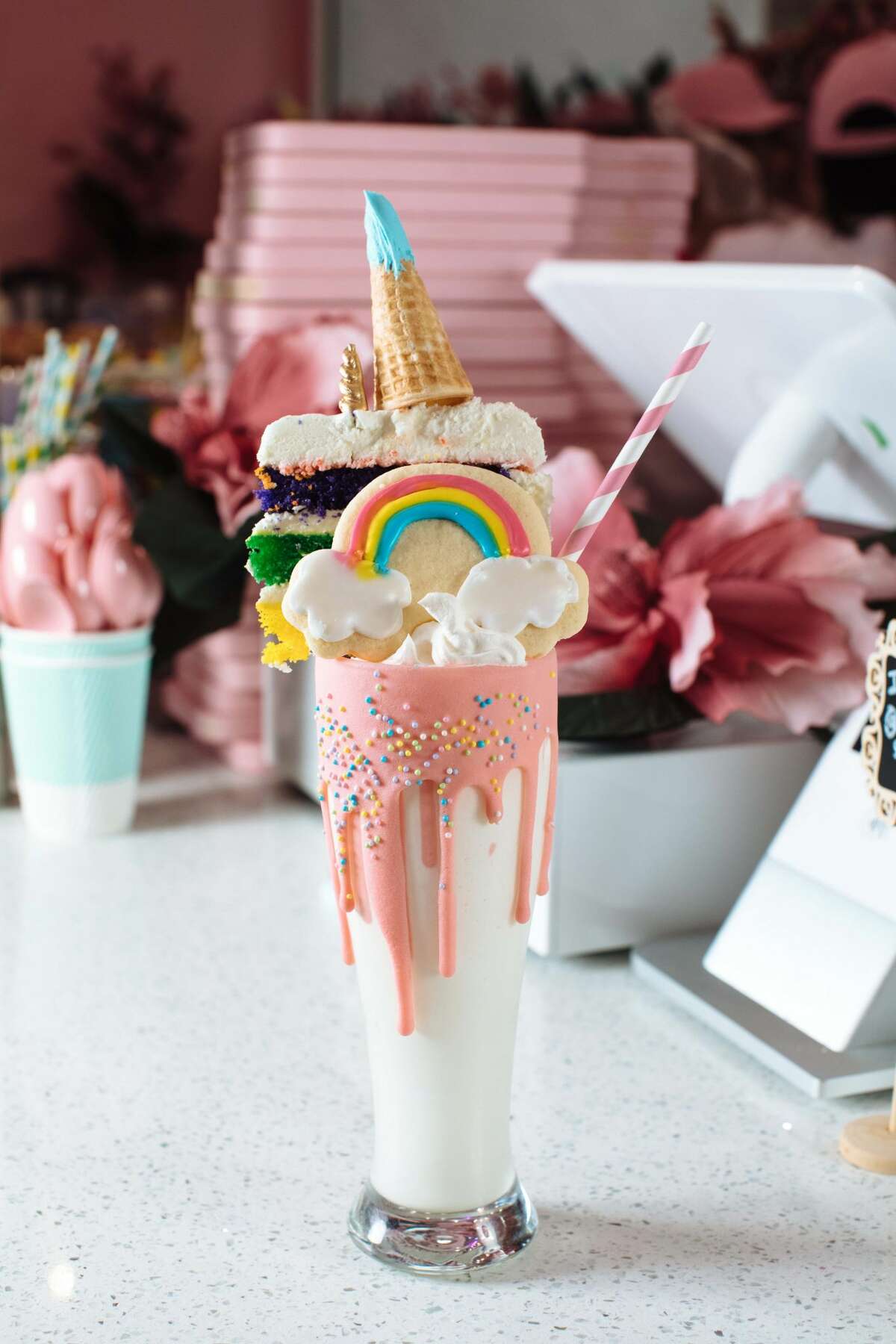 One of the most popular items at the Dallas location are the unicorn milkshakes. The vanilla milkshakes are topped with a piece of six-layer rainbow cake, adorned with a waffle cone that serves as the unicorn horn.